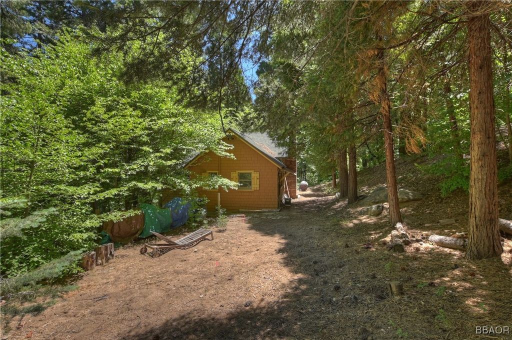 Photo of 714 BLUE JAY CYN Rd, Blue Jay, CA 92317 (MLS # 32501407)