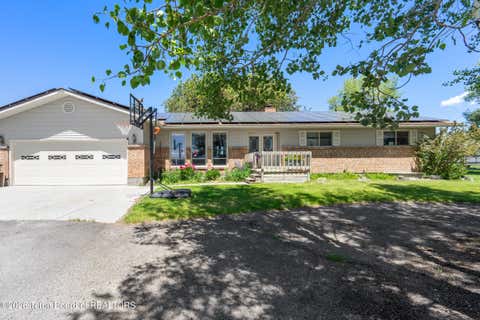 Photo of 3150 W HIGHWAY 33, Tetonia, ID 83452 (MLS # 26-1577)