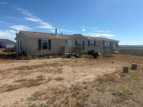 Photo of 1002 2ND Street, Big Piney, WY 83113 (MLS # 26-2452)