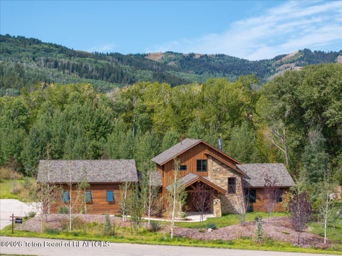 Photo of 9802 HIDDENWATERS Lane, Victor, ID 83455 (MLS # 26-2565)