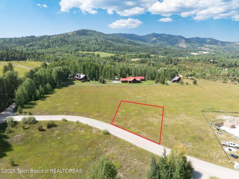 Photo of 9944 Hiddenwaters Lane, Victor, ID 83455 (MLS # 25-2443)