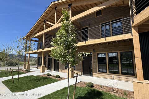 Photo of 9102 VILLAGE Way #101, Victor, ID 83455 (MLS # 26-1195)