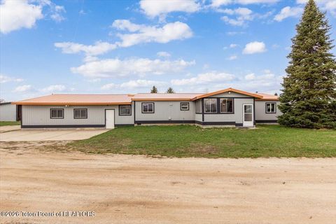 Photo of 861 W Highway 33, Tetonia, ID 83452 (MLS # 26-630)