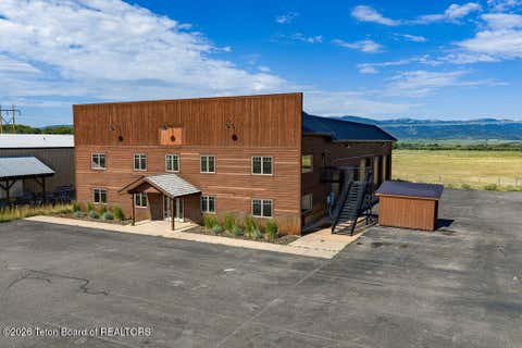 Photo of 744 ROCKY ROAD INDUSTRIAL Loop, Victor, ID 83455 (MLS # 26-2027)