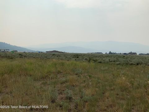 Photo of 108 SAGEBRUSH Lane, Alpine, WY 83128 (MLS # 26-451)