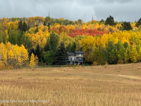 Photo of 1534 Aspen Hollow Rd, Thayne, WY 83127 (MLS # 26-750)