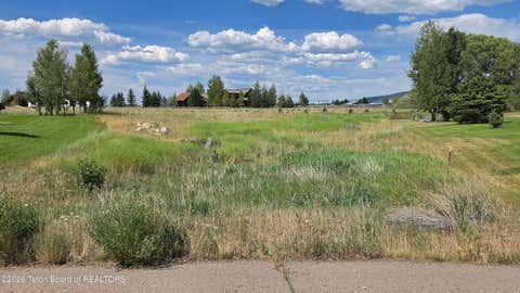 Photo of 6317 TRUMPET SWAN Circle, Victor, ID 83455 (MLS # 26-1832)
