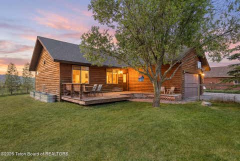 Photo of 4644 COUNTRY CLUB Drive, Victor, ID 83455 (MLS # 26-1411)