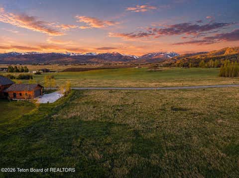 Photo of 9830 HIDDENWATERS Lane, Victor, ID 83455 (MLS # 26-996)