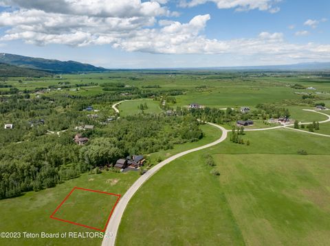 Photo of 9830 HIDDENWATERS Lane, Victor, ID 83455 (MLS # 26-996)