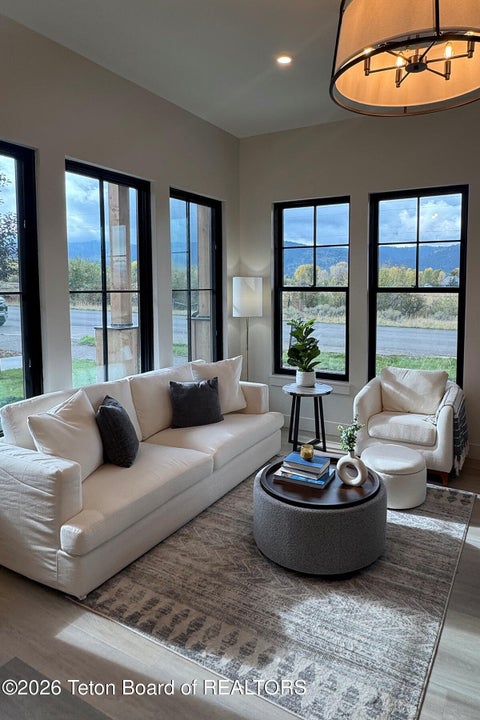 Photo of 9102 VILLAGE Way #105, Victor, ID 83455 (MLS # 26-1197)
