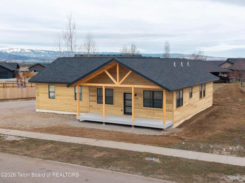 Photo of 1135 Wind River Trail, Driggs, ID 83422 (MLS # 26-477)