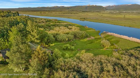 Photo of 3953 ADAMS Road, Driggs, ID 83422 (MLS # 26-1187)