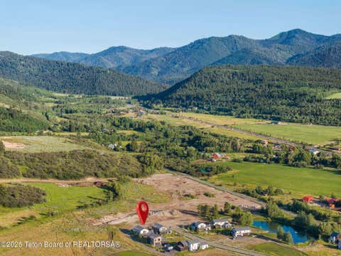 Photo of 454 MAIL CABIN Drive, Victor, ID 83455 (MLS # 26-1811)