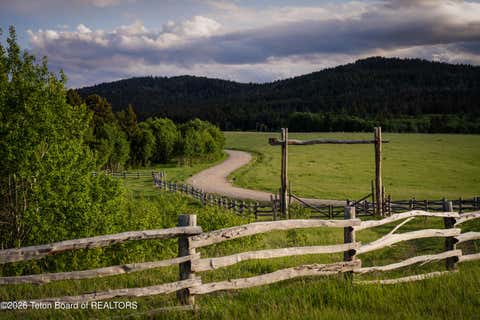 Photo of 8 NEVILLE SPRINGS RD, Tetonia, ID 83452 (MLS # 26-1502)