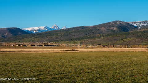 Photo of 6695 WILD MUSTANG Trail, Victor, ID 83455 (MLS # 26-907)