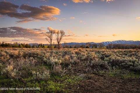 Photo of TBD E 3000 S, Driggs, ID 83422 (MLS # 26-601)