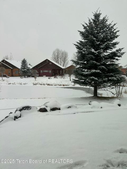 Photo of 321 Cedar Drive, Thayne, WY 83127 (MLS # 25-2883)