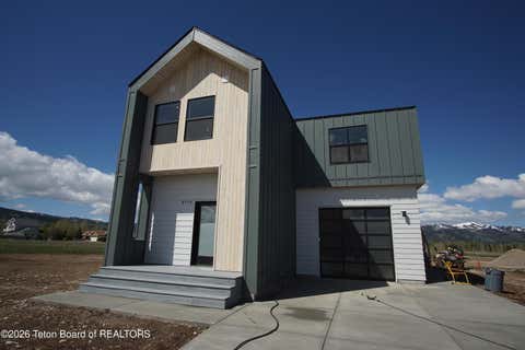 Photo of 8748 WINDY RIDGE Road, Victor, ID 83455 (MLS # 26-111)