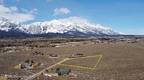 Photo of 8710 N Centennial Drive, Jackson, WY 83001 (MLS # 26-400)