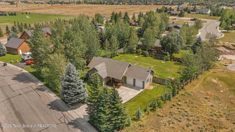 Photo of 670 APPALOOSA Trail, Driggs, ID 83422 (MLS # 26-2039)
