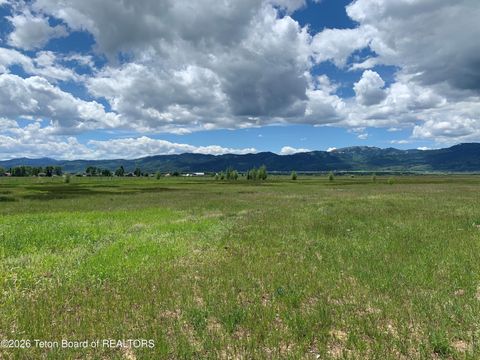Photo of 1302 River Drive, Victor, ID 83455 (MLS # 26-422)