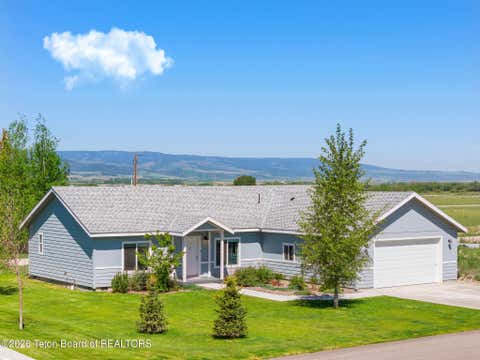 Photo of 3804 SPRUCE Road, Victor, ID 83455 (MLS # 26-1981)