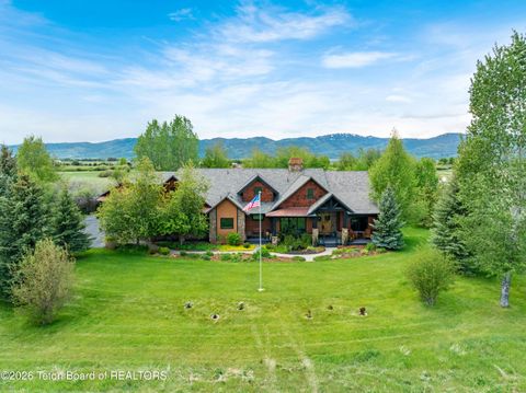 Photo of 6176 FOX MEADOWS Drive, Victor, ID 83455 (MLS # 26-1288)