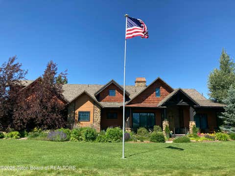Photo of 6176 FOX MEADOWS Drive, Victor, ID 83455 (MLS # 26-1288)