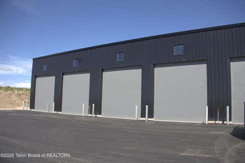 Photo of 162 BUSINESS CENTRE Circle #2, Driggs, ID 83422 (MLS # 26-2173)
