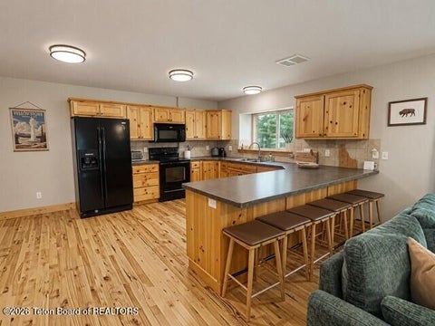 Photo of 1701 HONEYSUCKLE Loop, Driggs, ID 83422 (MLS # 26-1935)