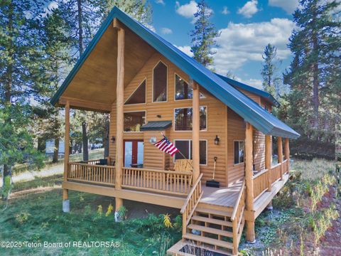 Photo of 40084010 Weasel Street, Island Park, ID 83429 (MLS # 25-167)