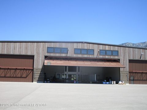 Photo of 209 S REFUGE PKWY Pkwy #23, Alpine, WY 83128 (MLS # 26-1244)