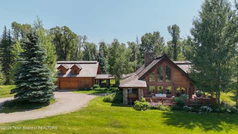 Photo of 9055 N SNAKE RIVER Drive, Jackson, WY 83001 (MLS # 26-2113)
