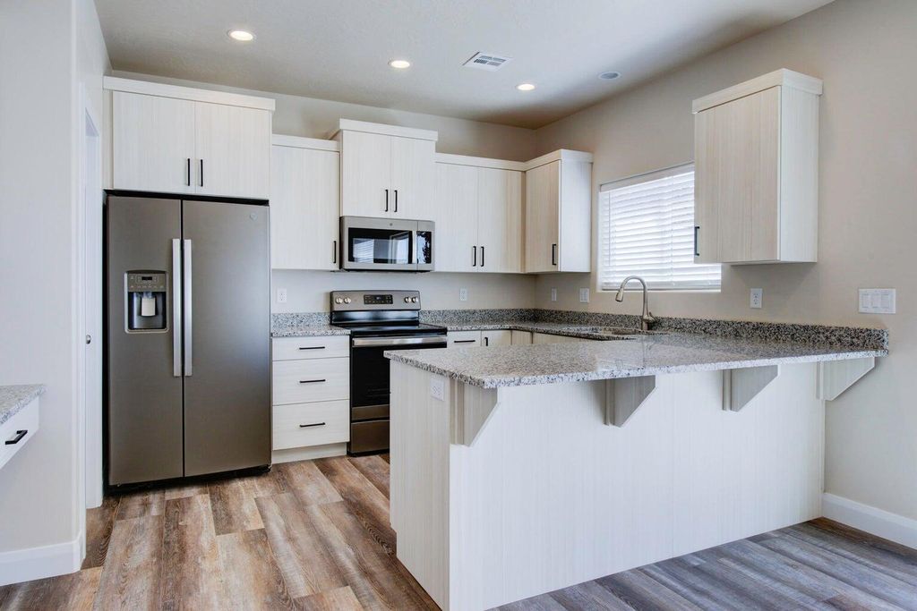 Photo of 668 E Fiddlers Cove DR #24, Cedar City, UT 84721 (MLS # 115708)
