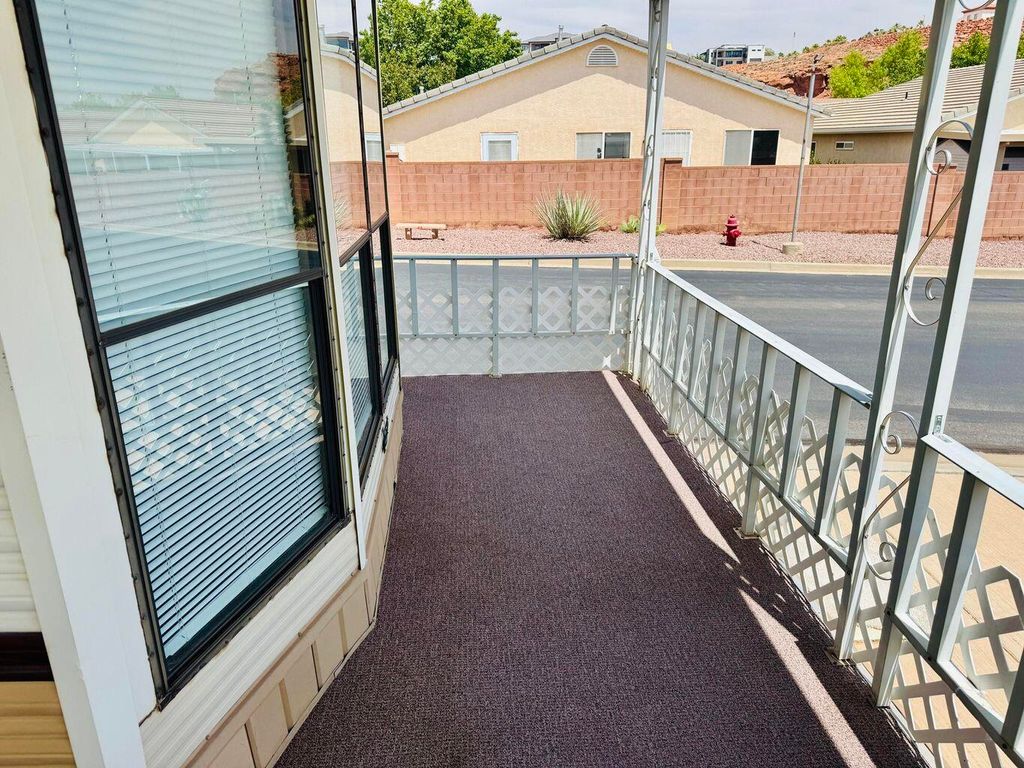 Photo of 1150 W Red Hills Parkway #122, Washington, UT 84780 (MLS # 112602)