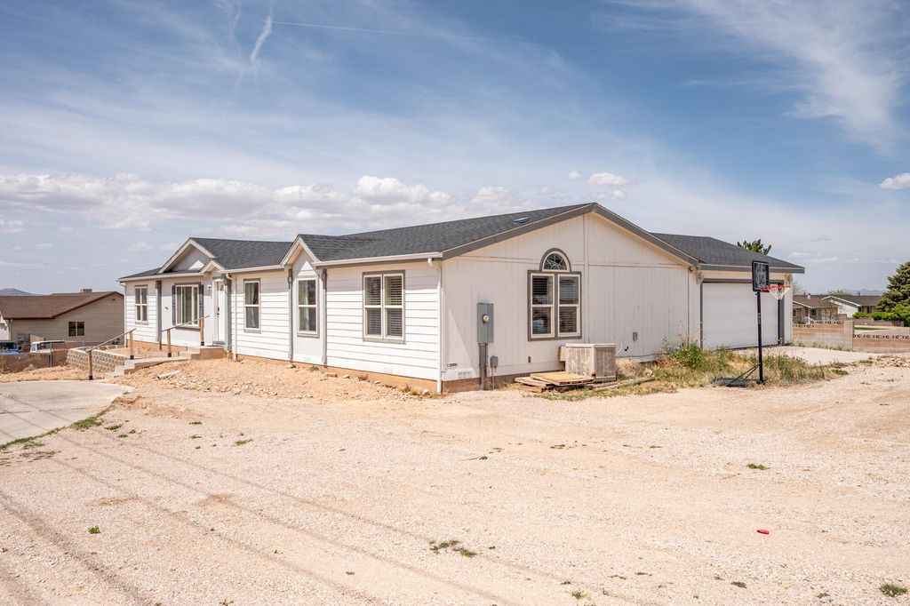 Photo of 1637 E Midvalley Rd Rd, Enoch, UT 84721 (MLS # 115836)