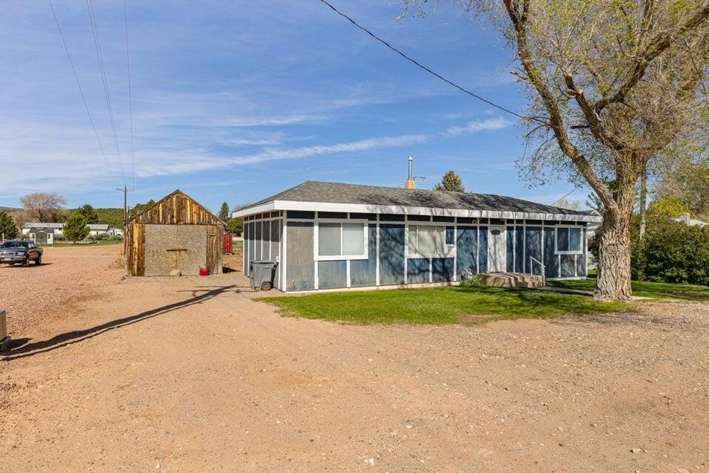 Photo of 318 S Center ST, Enterprise, UT 84725 (MLS # 115880)