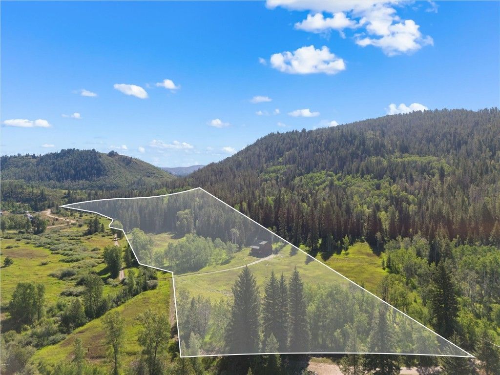 Photo of 29030 Owl Drive, Clark, CO 80428 (MLS # S1053541)