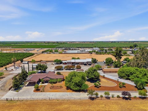 Photo of 597 Crawford Avenue, Porterville, CA 93257 (MLS # 243022)