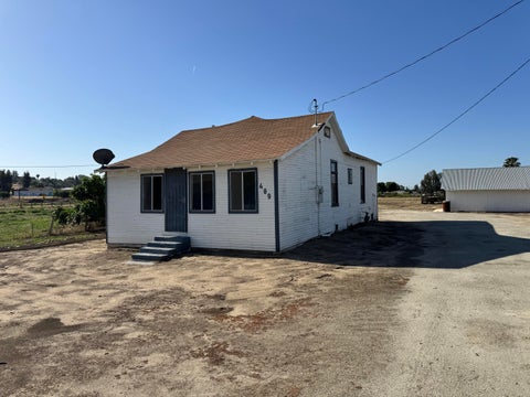 Photo of 489 W Westfield Avenue, Porterville, CA 93257 (MLS # 241746)