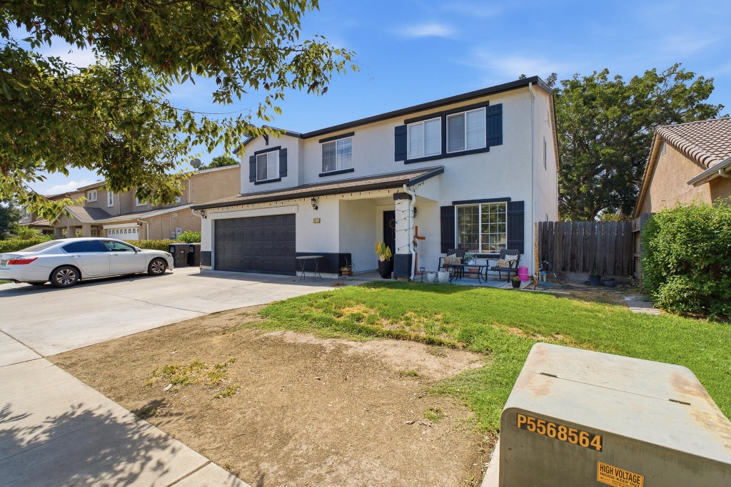 Photo of 3031 W Payson Avenue, Visalia, CA 93291 (MLS # 243465)