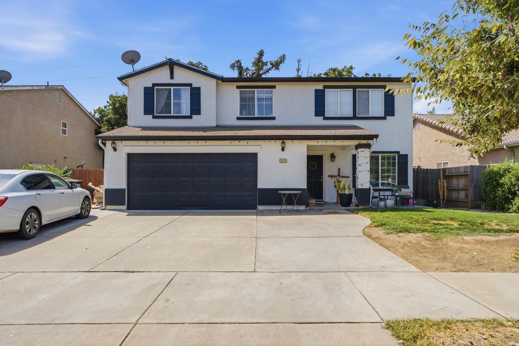 Photo of 3031 W Payson Avenue, Visalia, CA 93291 (MLS # 243465)