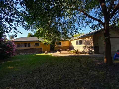 Photo of 1336 W Paradise Avenue, Visalia, CA 93277 (MLS # 242413)