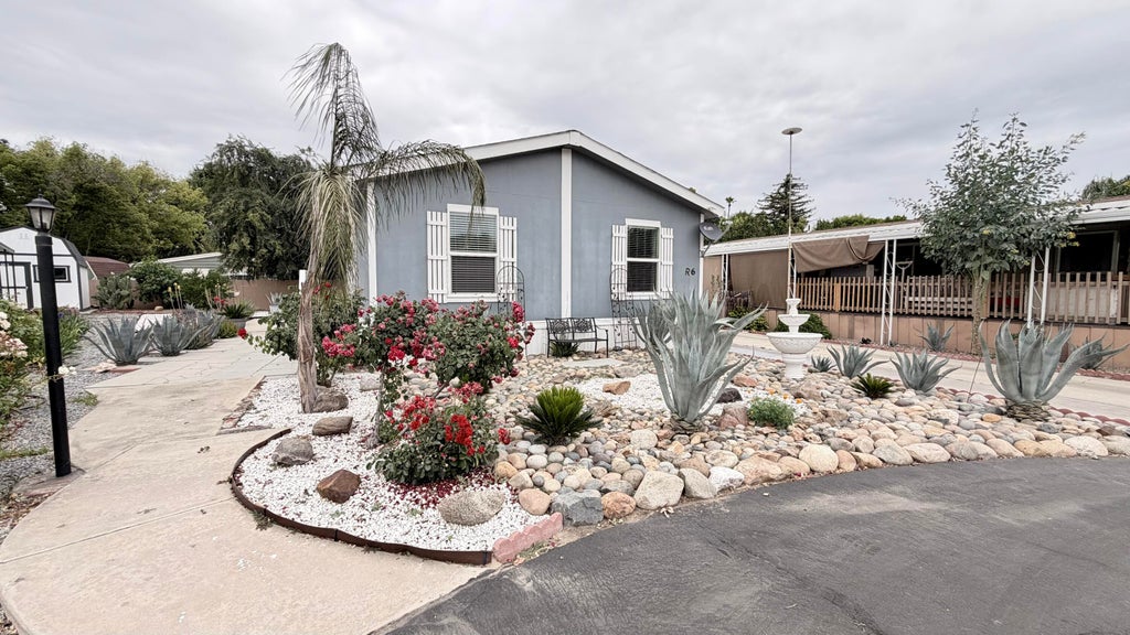 Photo of 2400 W Midvalley Avenue R6 #R6, Visalia, CA 93277 (MLS # 242164)