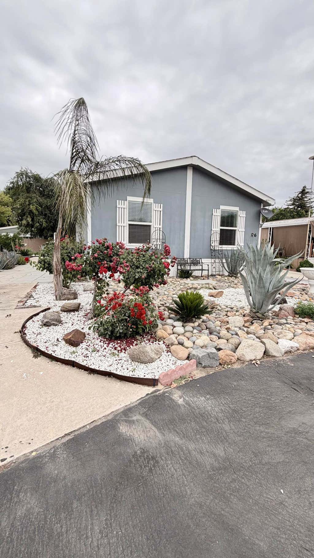 Photo of 2400 W Midvalley Avenue R6 #R6, Visalia, CA 93277 (MLS # 242164)
