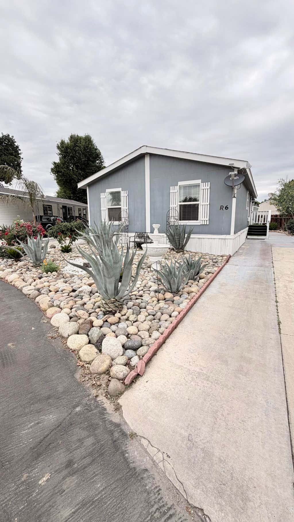Photo of 2400 W Midvalley Avenue R6 #R6, Visalia, CA 93277 (MLS # 242164)
