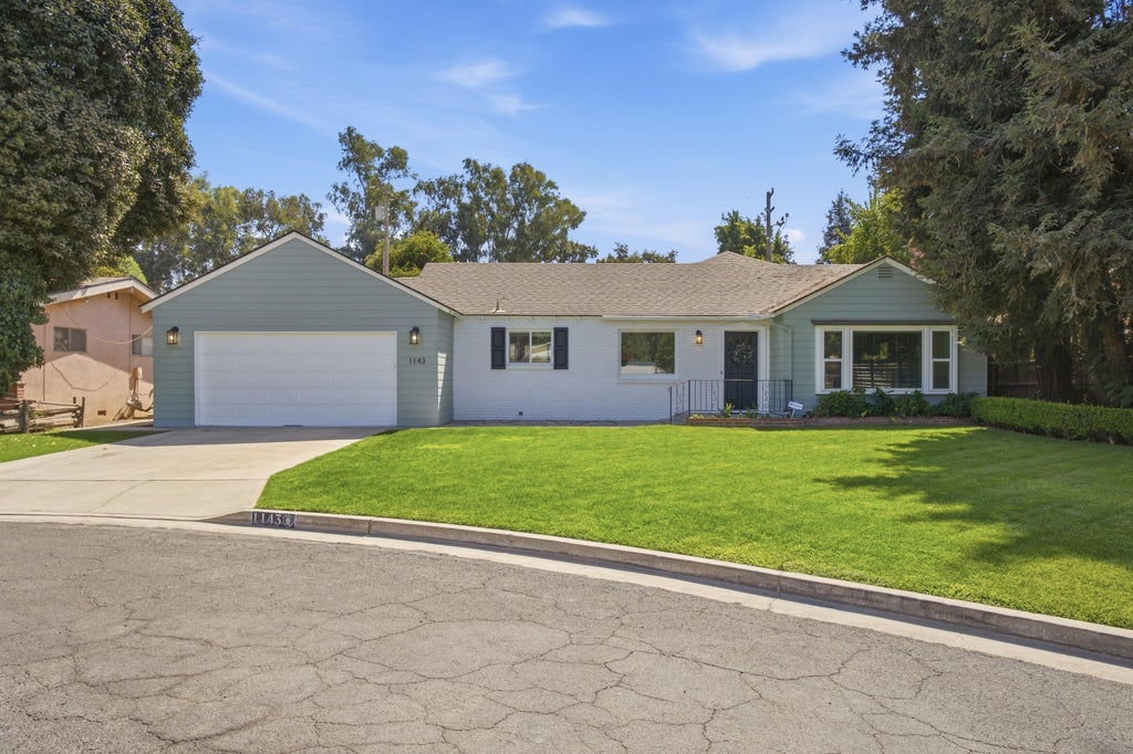 Photo of 1143 W Howard Avenue, Visalia, CA 93277 (MLS # 244465)