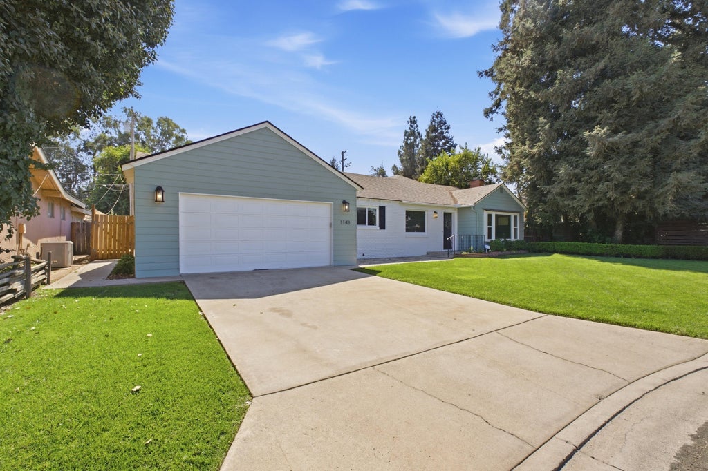 Photo of 1143 W Howard Avenue, Visalia, CA 93277 (MLS # 244465)
