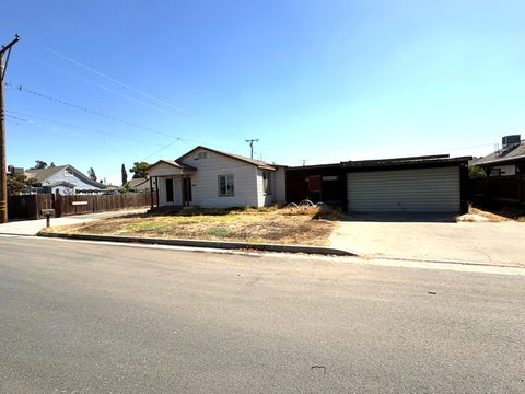 Photo of 329 W Owens Avenue, Tulare, CA 93274 (MLS # 244510)